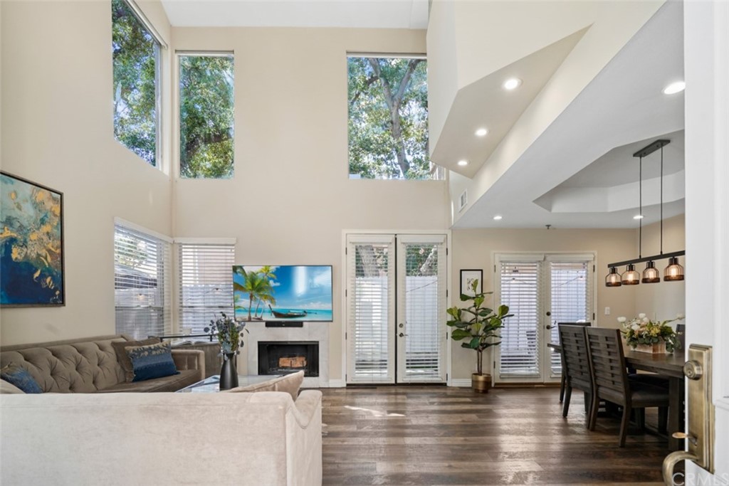 6255 Honolulu Avenue, Unit 23 Tujunga, CA 91042 - Photo 3 of 36 a living room with furniture and a fireplace