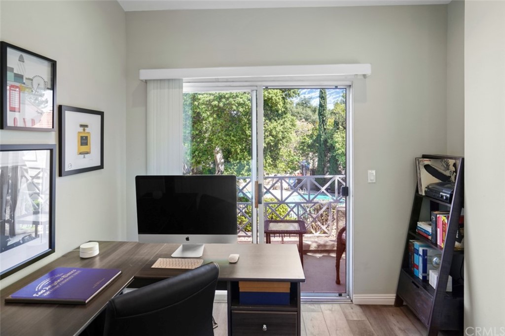 6255 Honolulu Avenue, Unit 23 Tujunga, CA 91042 - Photo 32 of 36 a view of a workspace with furniture and a window