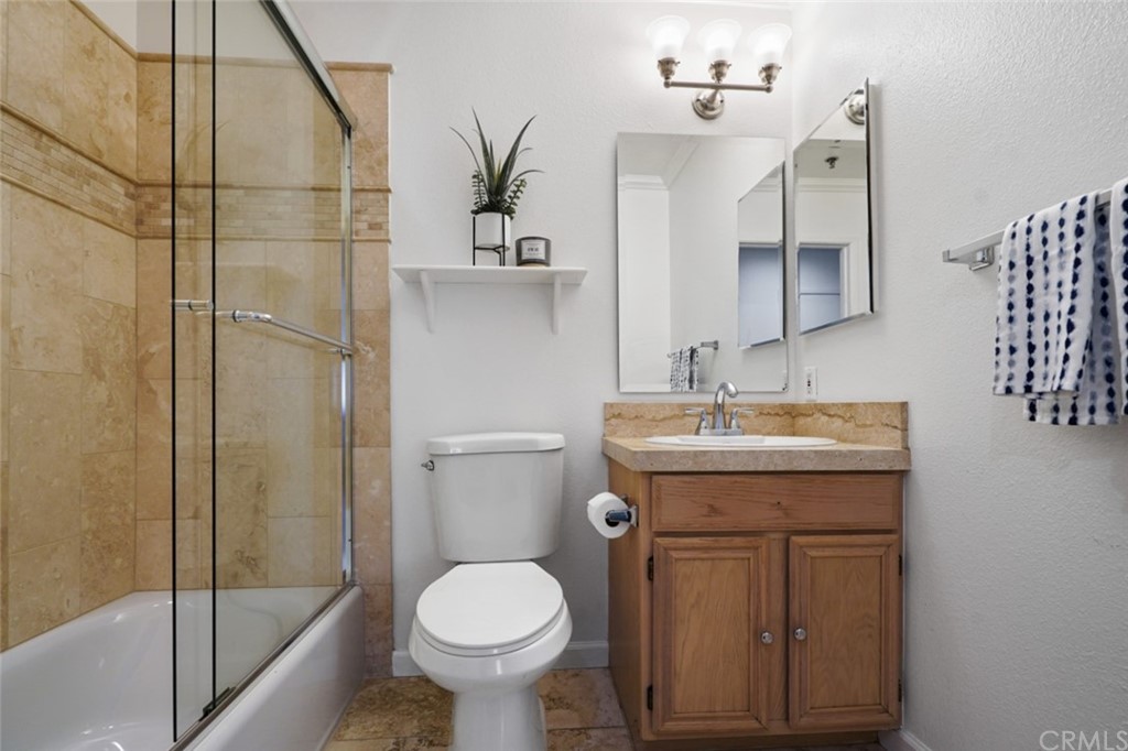 6255 Honolulu Avenue, Unit 23 Tujunga, CA 91042 - Photo 35 of 36 a bathroom with a sink toilet and shower