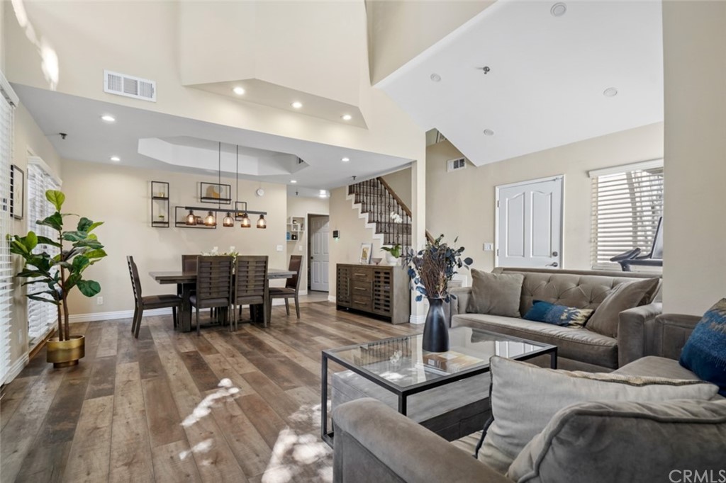 6255 Honolulu Avenue, Unit 23 Tujunga, CA 91042 - Photo 5 of 36 a living room with furniture and a couch