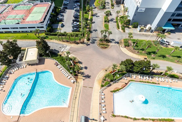 swimming pool view with a outdoor seating space