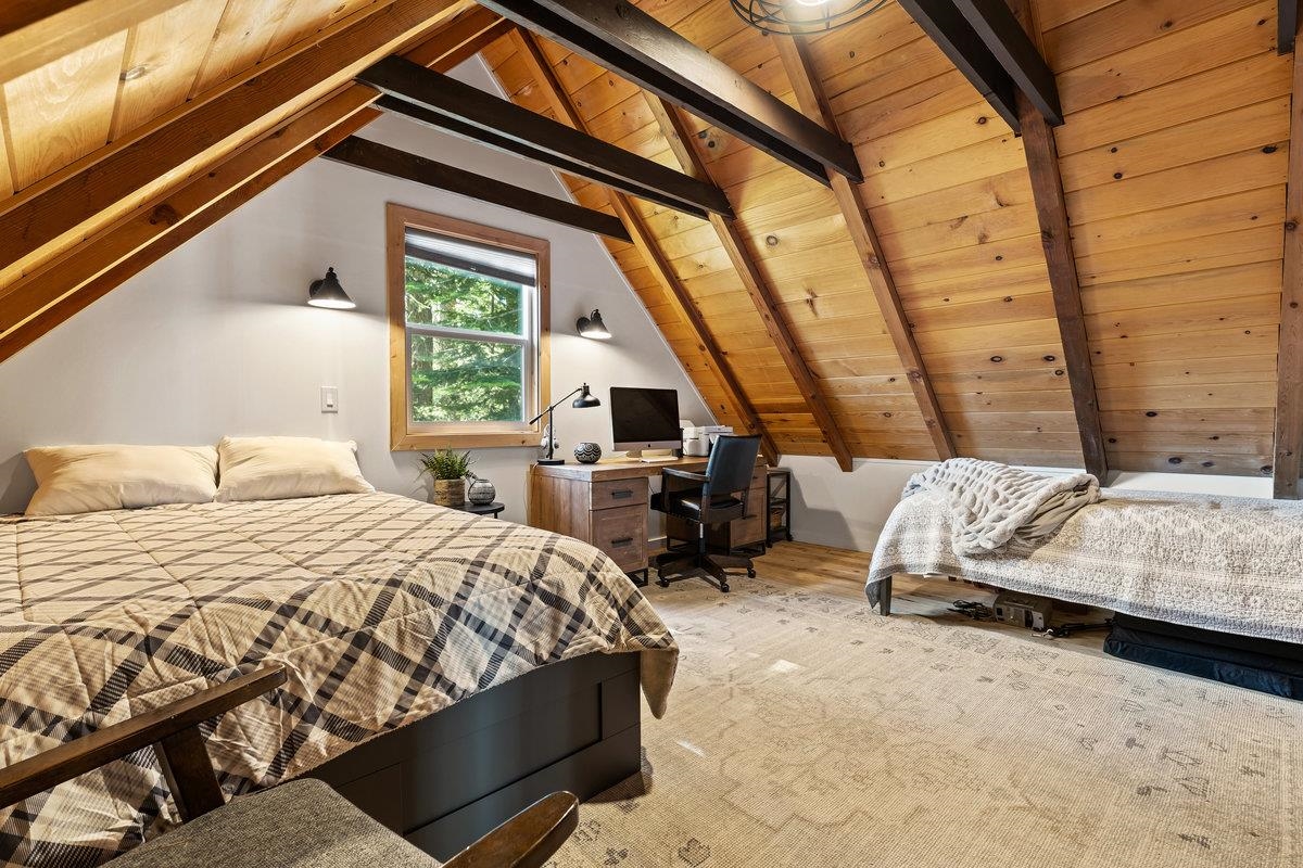 10175 Washoe Road Truckee, CA 96161 - Photo 12 of 20 a bedroom with a bed and a large window