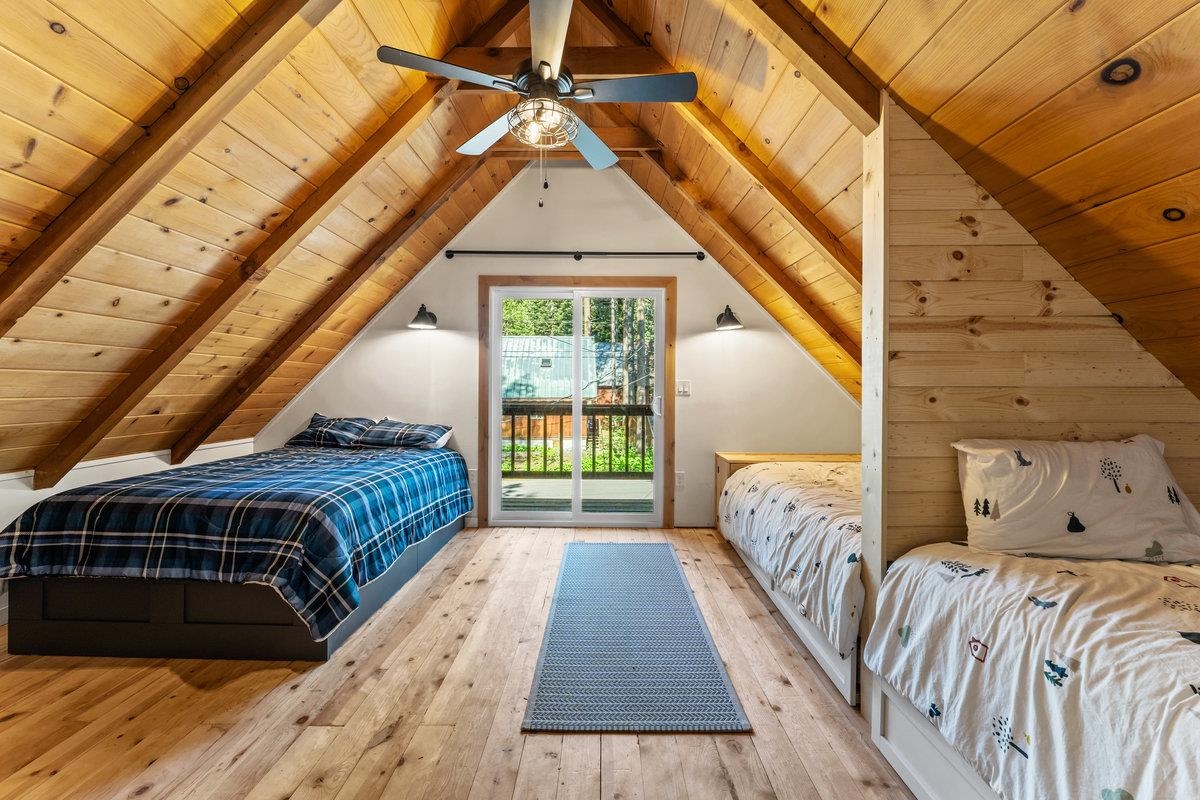 10175 Washoe Road Truckee, CA 96161 - Photo 13 of 20 a bed sitting in a bedroom next to a window