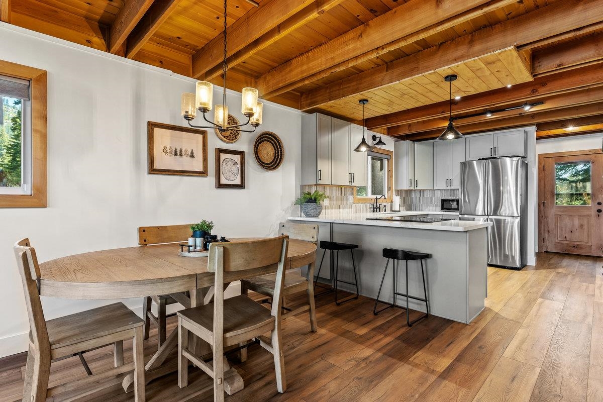 10175 Washoe Road Truckee, CA 96161 - Photo 5 of 20 a kitchen with a table and chairs in it