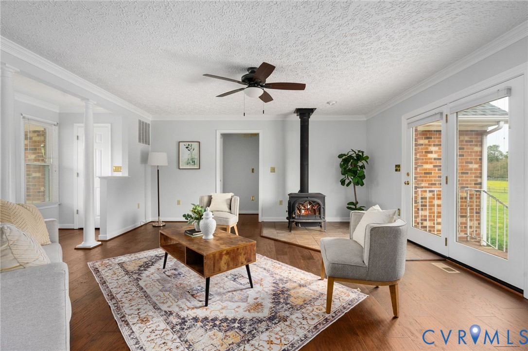 16379 Arch Hill Road Hanover, VA 23069 - Photo 7 of 26 a living room with furniture and wooden floor