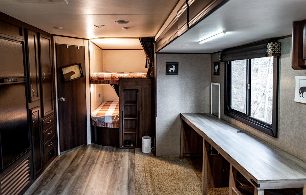 107 23rd Street Ellijay, GA 30540 - Photo 13 of 45 a kitchen with refrigerator and window