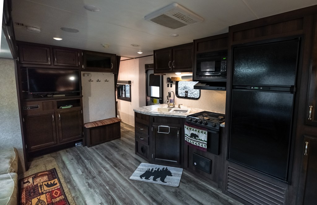 107 23rd Street Ellijay, GA 30540 - Photo 15 of 45 a kitchen with a refrigerator and a stove
