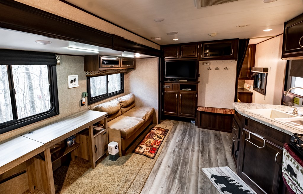 107 23rd Street Ellijay, GA 30540 - Photo 16 of 45 a kitchen with stainless steel appliances granite countertop a refrigerator and a stove