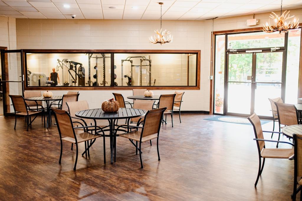 107 23rd Street Ellijay, GA 30540 - Photo 19 of 45 a view of a a dining room with furniture window and wooden floor