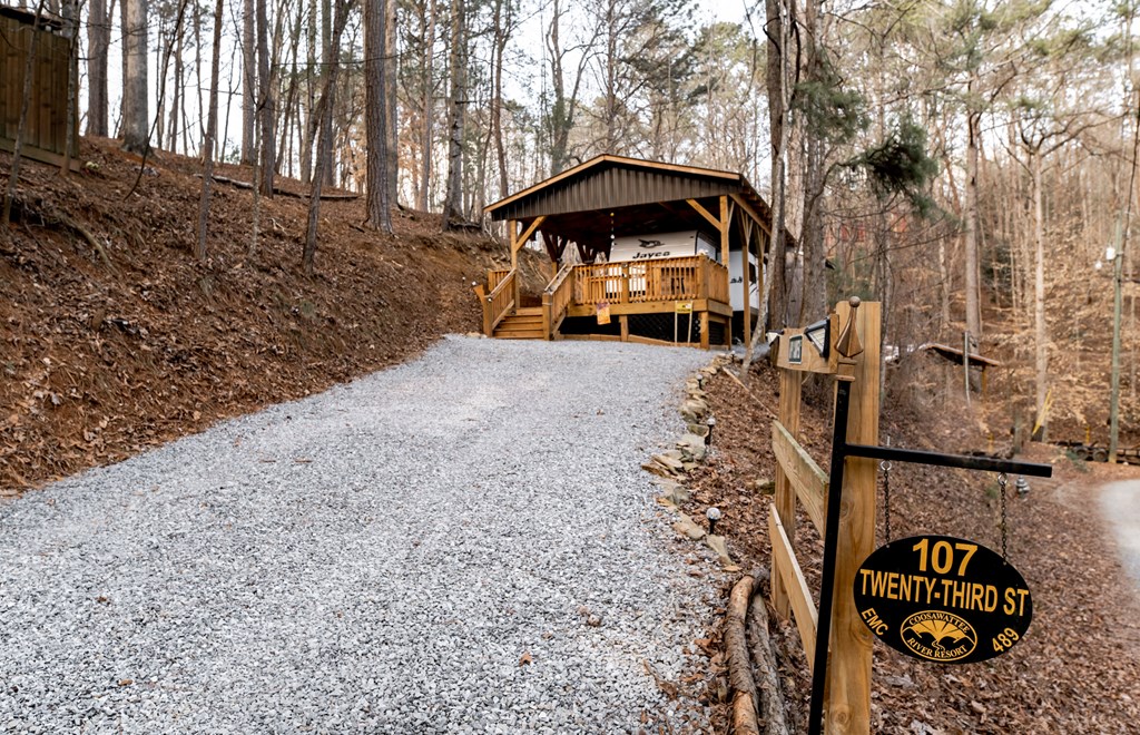 107 23rd Street Ellijay, GA 30540 - Photo 2 of 45 a view of a wooden fence with an trees