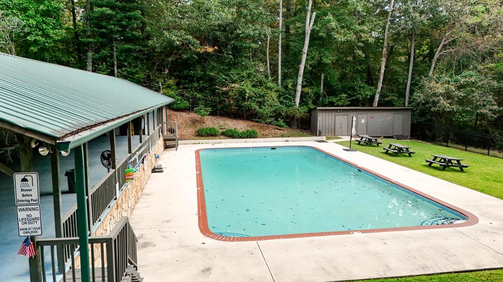 107 23rd Street Ellijay, GA 30540 - Photo 39 of 45 a view of a swimming pool with a patio