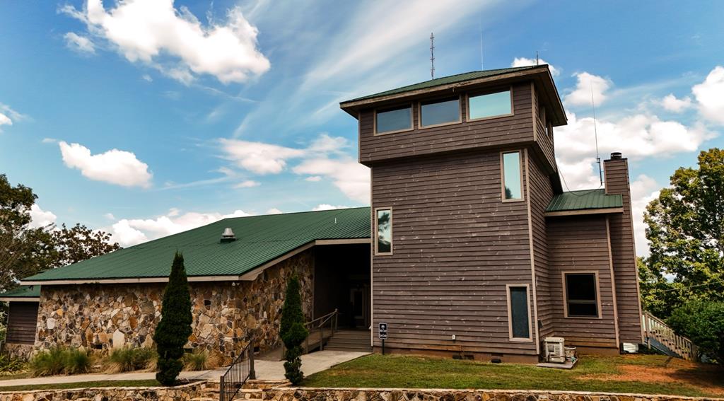 107 23rd Street Ellijay, GA 30540 - Photo 41 of 45 a front view of a house with garden