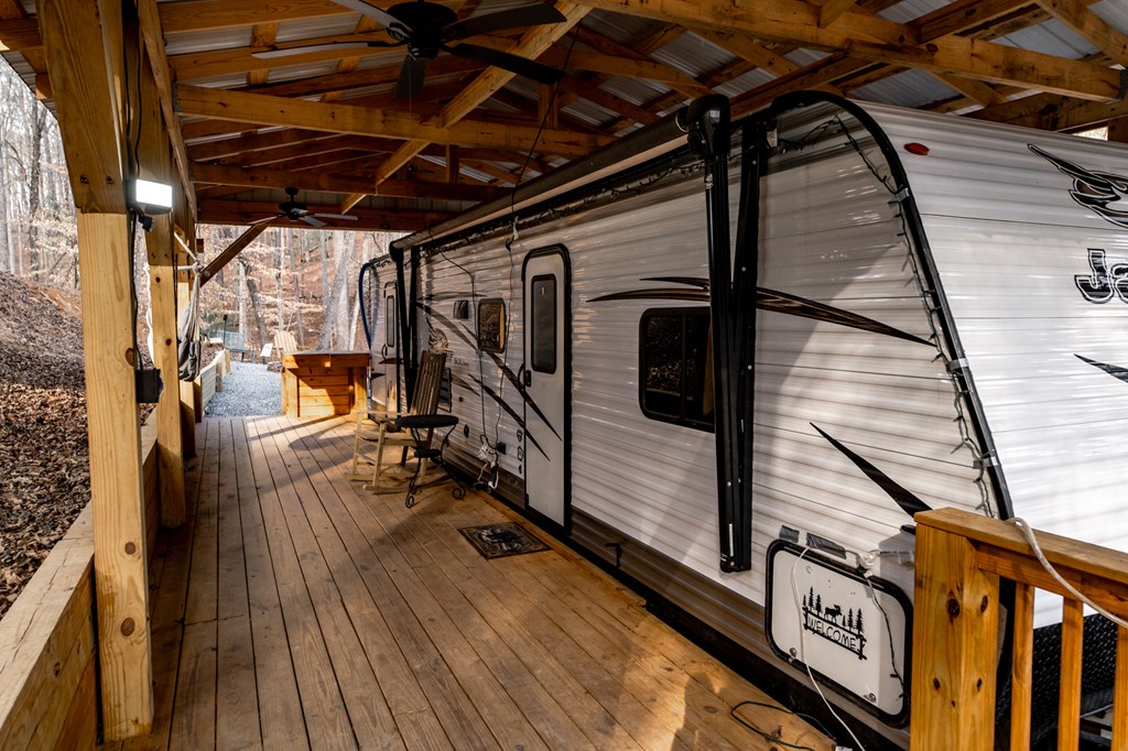 107 23rd Street Ellijay, GA 30540 - Photo 6 of 45 a view of a balcony with wooden floor