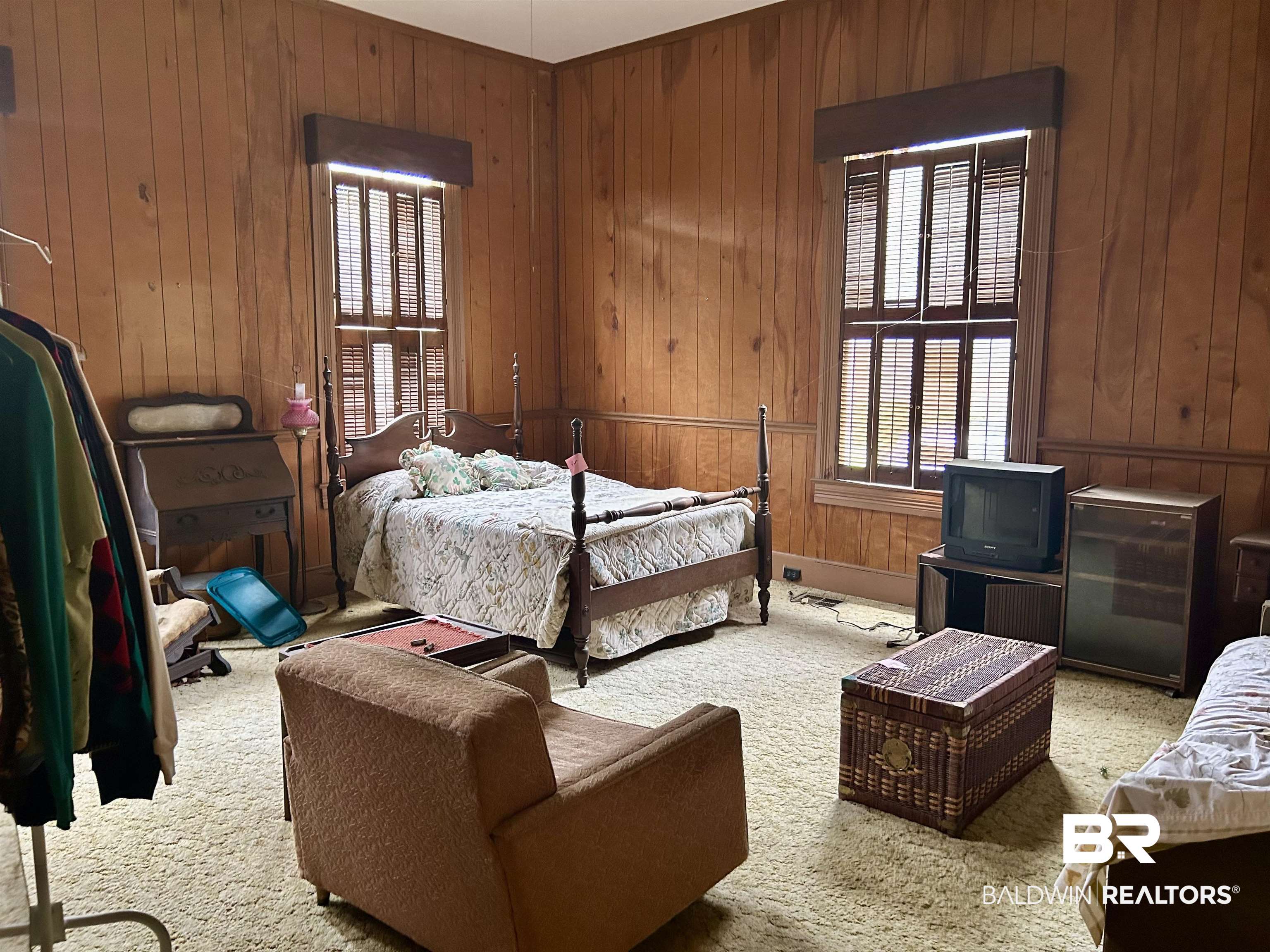 302 Stocking Street Mobile, AL 36604 - Photo 14 of 31 Paneled walls and two windows with interior shutters