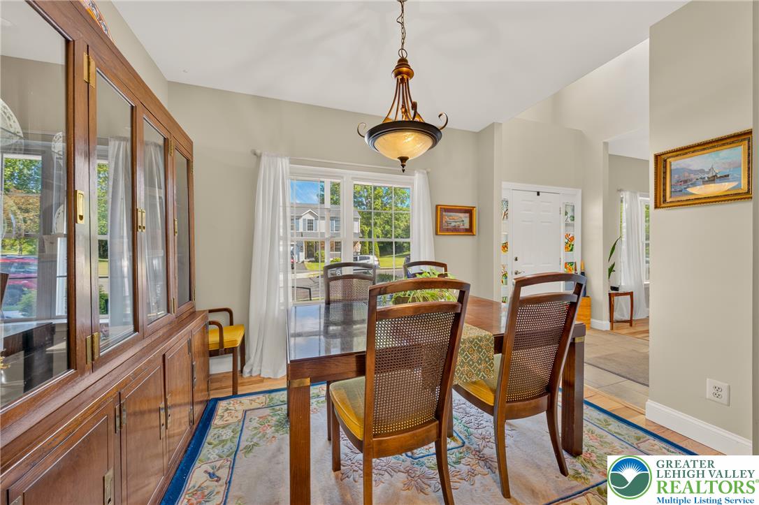 1702 Red Bud Road Quakertown, PA 18951 - Photo 10 of 68 A refined dining space with ample room for entertaining and everyday meals.