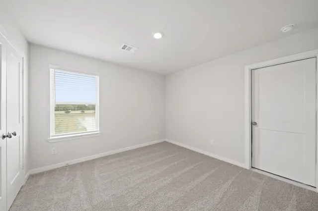 an empty room with a window