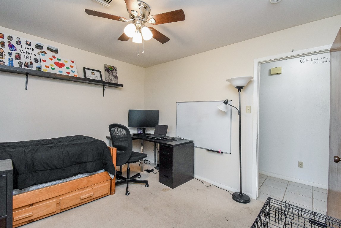 2719 Vail Road Rosenberg, TX 77471 - Photo 29 of 37 a bedroom with a workspace