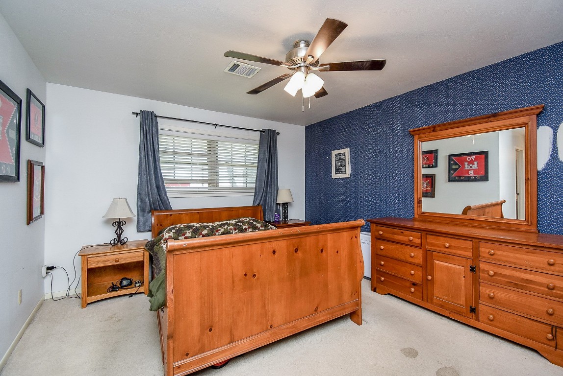 2719 Vail Road Rosenberg, TX 77471 - Photo 32 of 37 a bedroom with furniture and a window