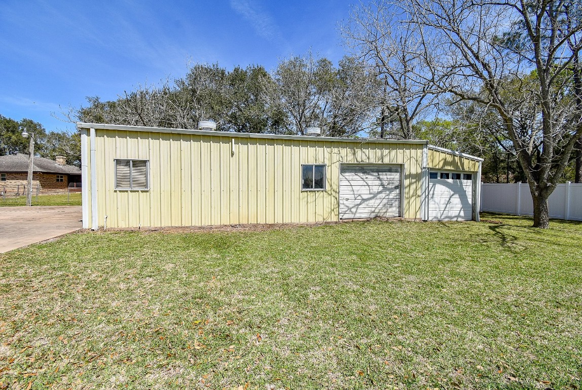 2719 Vail Road Rosenberg, TX 77471 - Photo 7 of 37 a white house that has tree in front of it