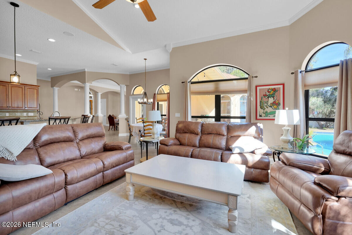 2942 Magnolia Road Orange Park, FL 32065 - Photo 15 of 50 a living room with furniture kitchen and a large window