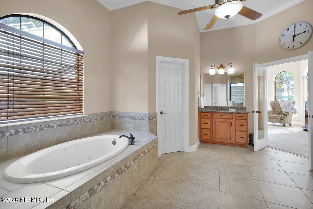 2942 Magnolia Road Orange Park, FL 32065 - Photo 25 of 50 a large spacious bathroom with a large tub and shower