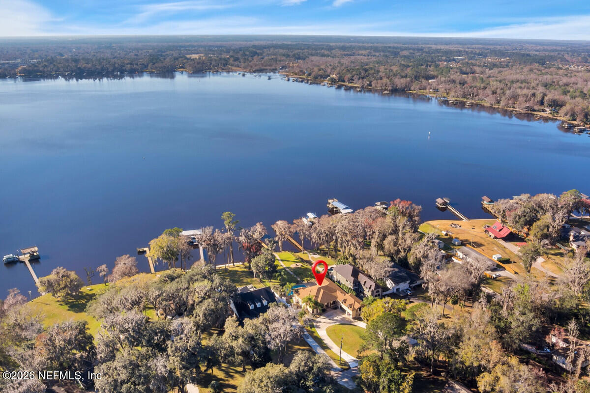 2942 Magnolia Road Orange Park, FL 32065 - Photo 3 of 50 a view of a lake with a mountain