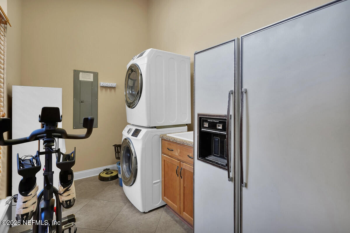 2942 Magnolia Road Orange Park, FL 32065 - Photo 39 of 50 a utility room with dryer and washer