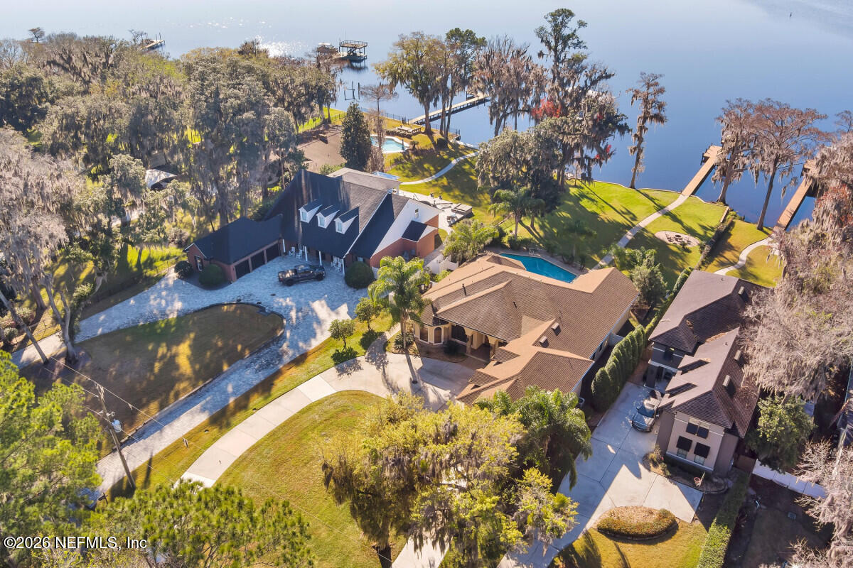 2942 Magnolia Road Orange Park, FL 32065 - Photo 48 of 50 an aerial view of residential house with outdoor space and swimming pool