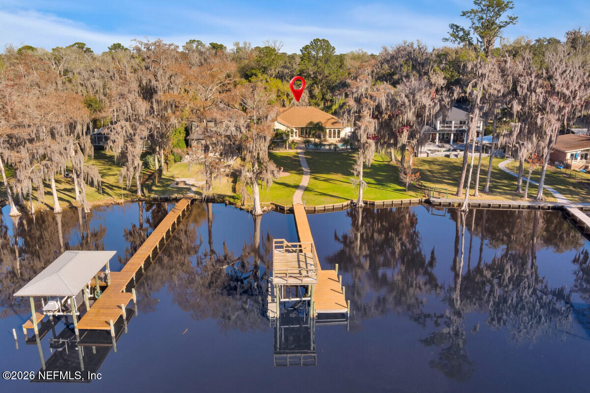 2942 Magnolia Road Orange Park, FL 32065 - Photo 5 of 50 a view of a chairs and table on the terrace