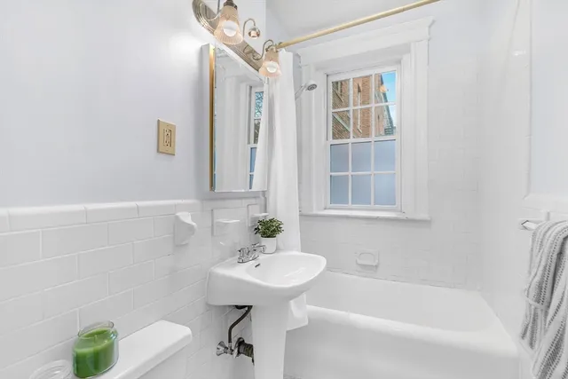 a bathroom with a sink and a bathtub