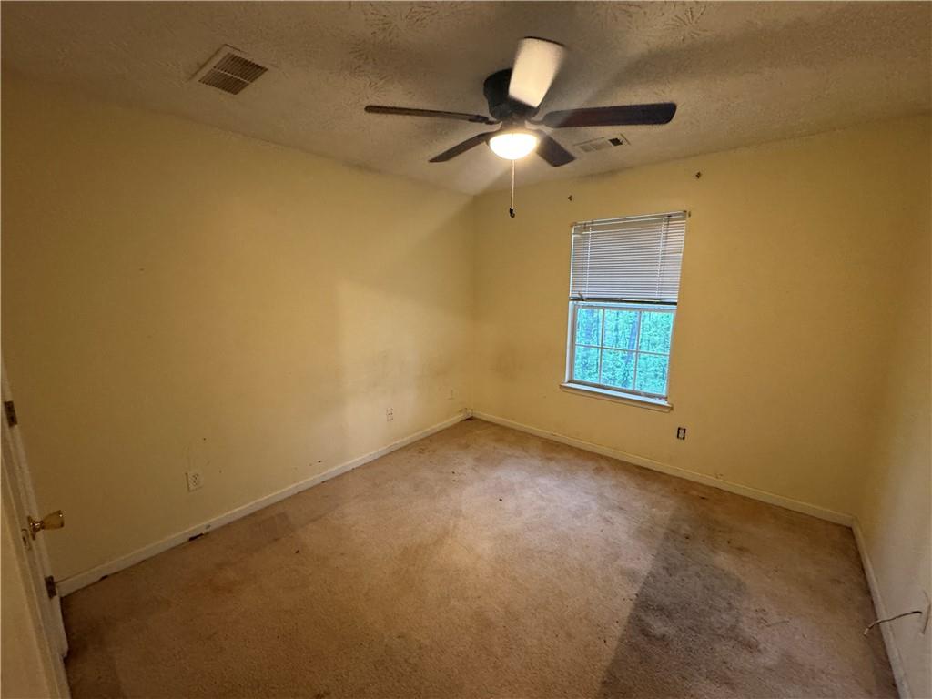 3653 Woodland Cove Decatur, GA 30034 - Photo 11 of 19 a view of an empty room with a window