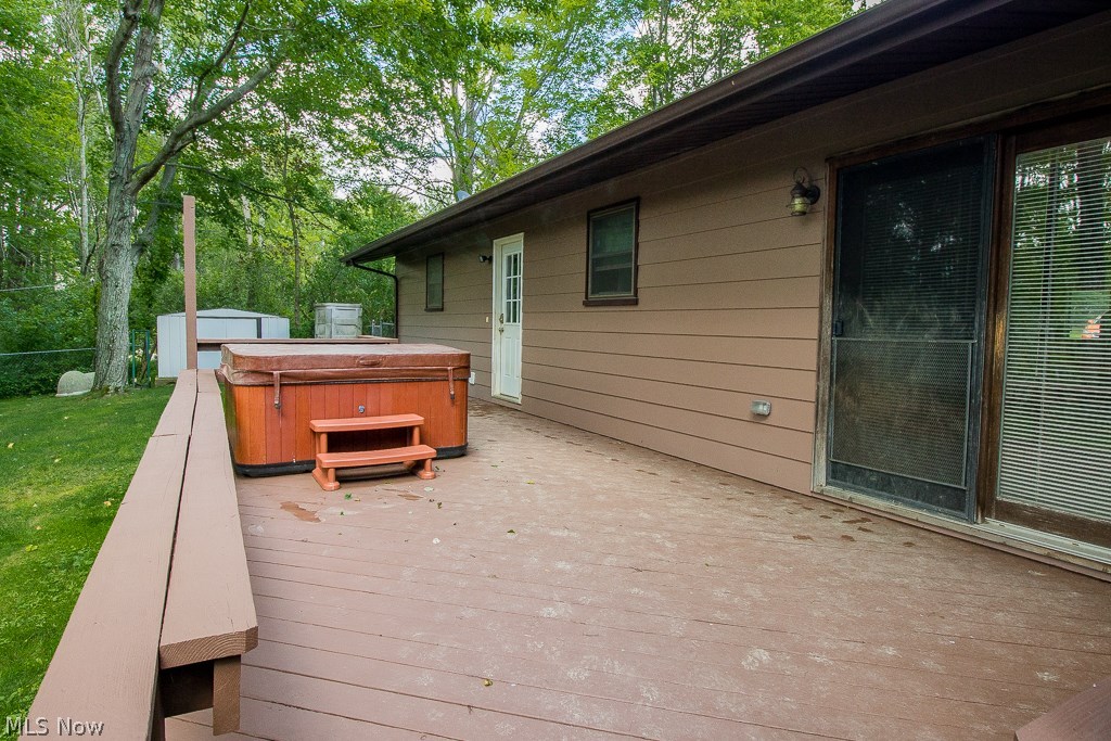 8610 Sumner Road Chardon, OH 44024 - Photo 33 of 35 Wood deck with hot tub.