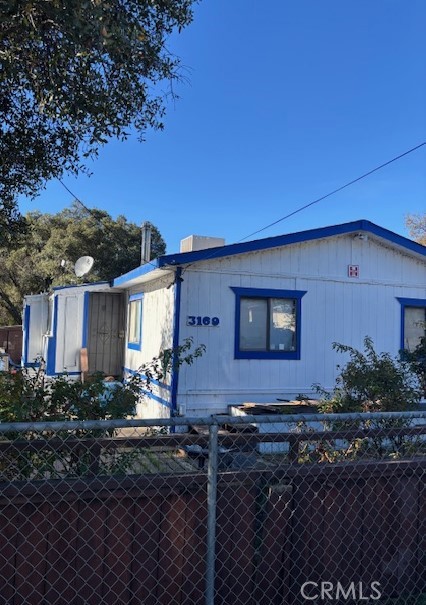 3169 2nd Street, Unit D Clearlake, CA 95422 - Photo 1 of 15 a front view of a house with garden