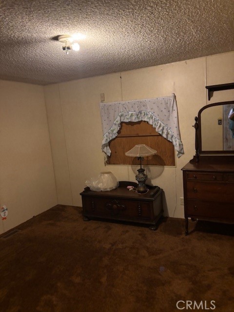 3169 2nd Street, Unit D Clearlake, CA 95422 - Photo 13 of 15 a room with a fireplace and a lamp