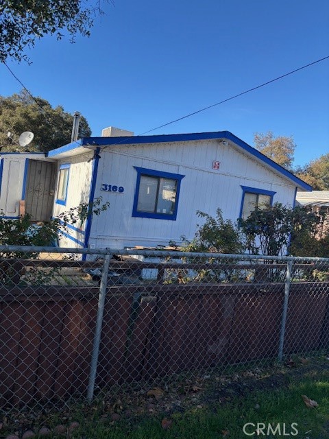 3169 2nd Street, Unit D Clearlake, CA 95422 - Photo 2 of 15 a front view of a house with garden