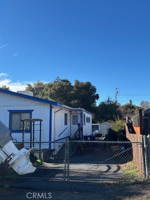 3169 2nd Street, Unit D Clearlake, CA 95422 - Photo 3 of 15 a view of a house with backyard porch and sitting area