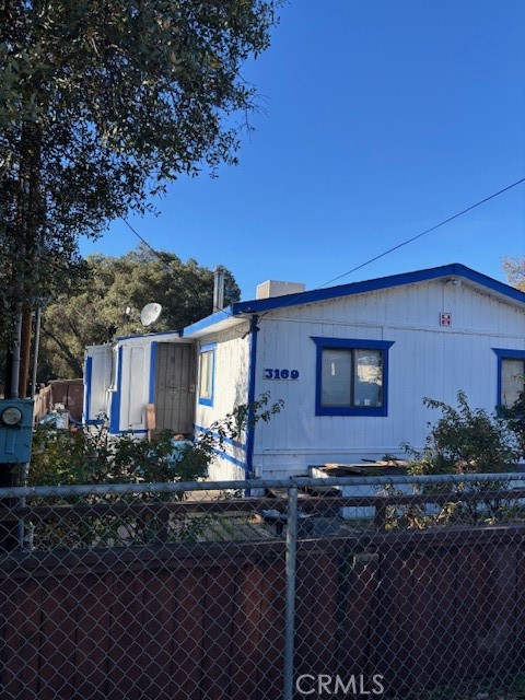 3169 2nd Street, Unit D Clearlake, CA 95422 - Photo 4 of 15 a front view of a house with garden