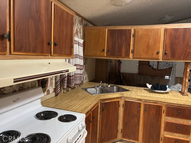 3169 2nd Street, Unit D Clearlake, CA 95422 - Photo 7 of 15 a kitchen with a stove and a sink