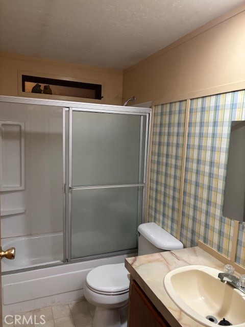 3169 2nd Street, Unit D Clearlake, CA 95422 - Photo 10 of 15 a bathroom with a granite countertop toilet sink and shower