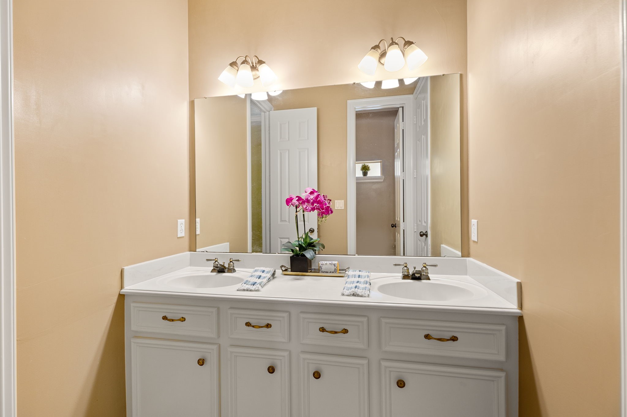 6610 Radley Drive Spring, TX 77379 - Photo 32 of 50 Double vanity Jack-n-Jill bath connects guest bedroom 3 & 4. Privacy door to shower/tub & toilet.