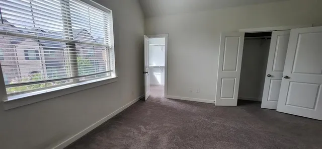 a view of a kitchen with a sink and a stove