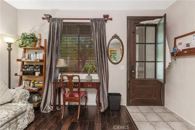 a view of livingroom with furniture and toys