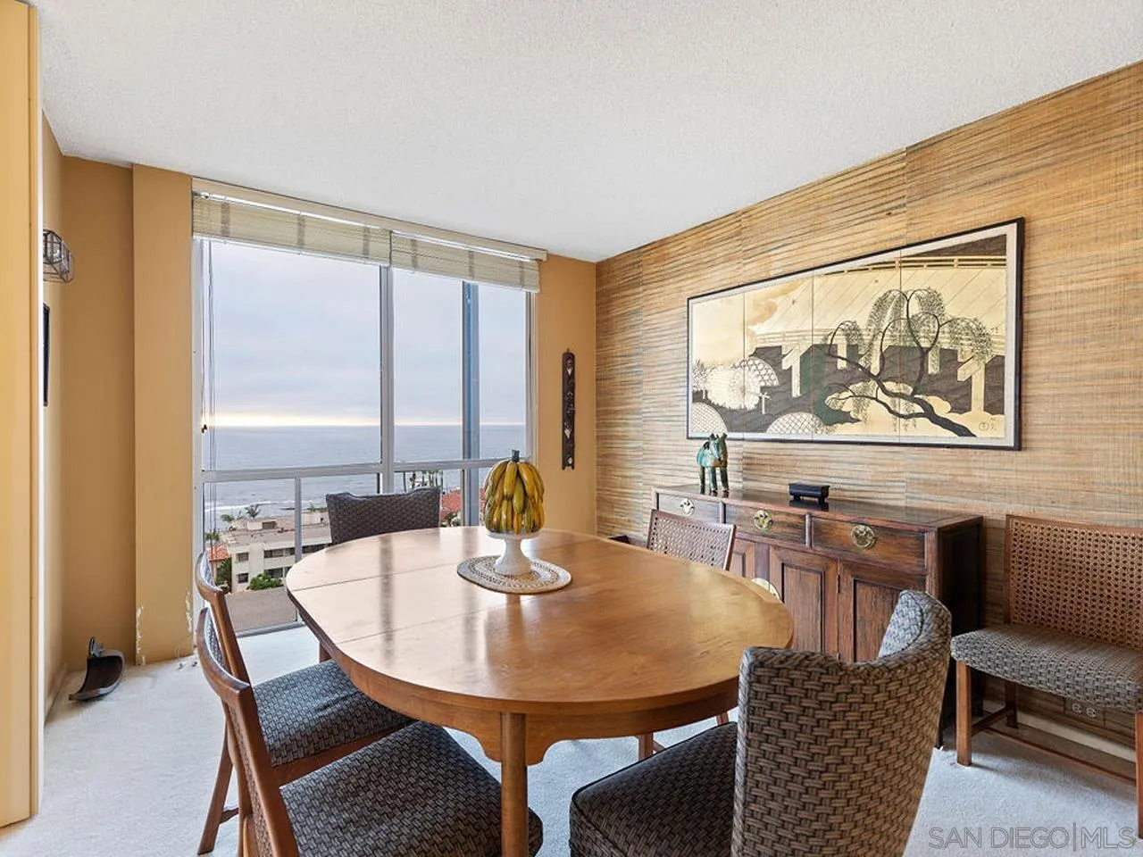 800 Prospect Street, Unit 4A La Jolla, CA 92037 - Photo 16 of 34 a view of a dining room with furniture window and outside view