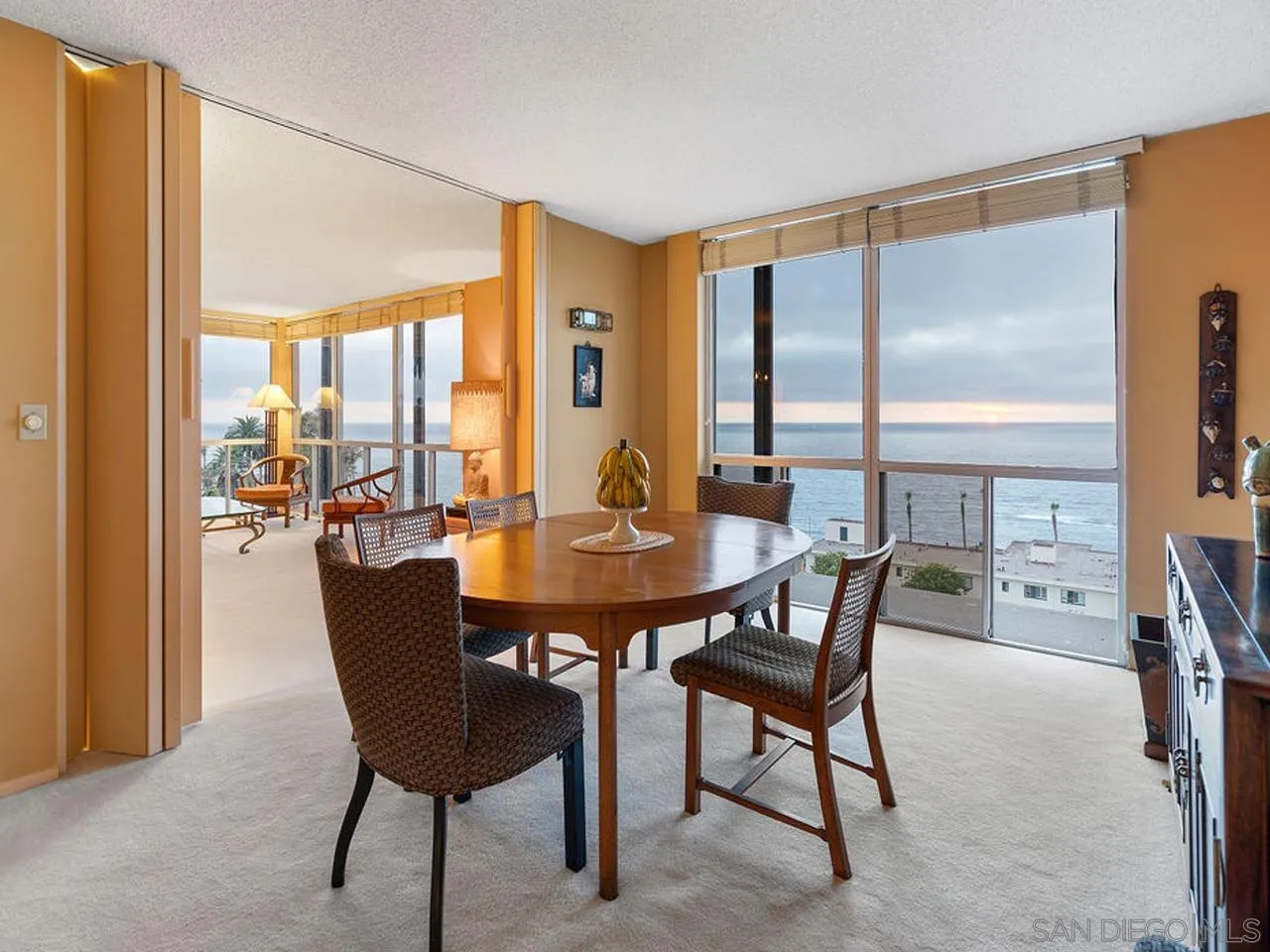 800 Prospect Street, Unit 4A La Jolla, CA 92037 - Photo 18 of 34 a view of a dining room with furniture and a window