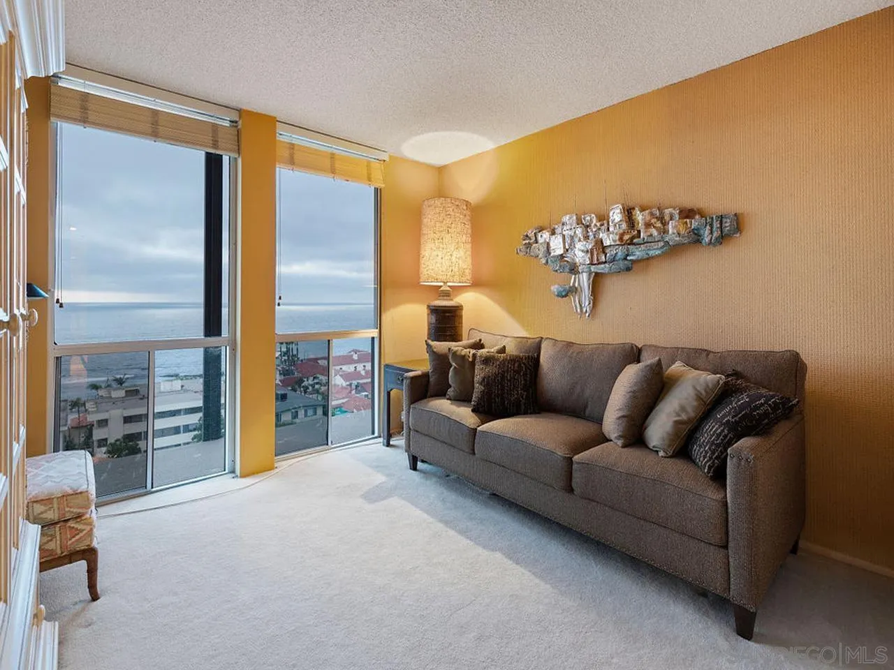 800 Prospect Street, Unit 4A La Jolla, CA 92037 - Photo 27 of 34 a living room with furniture and a large window