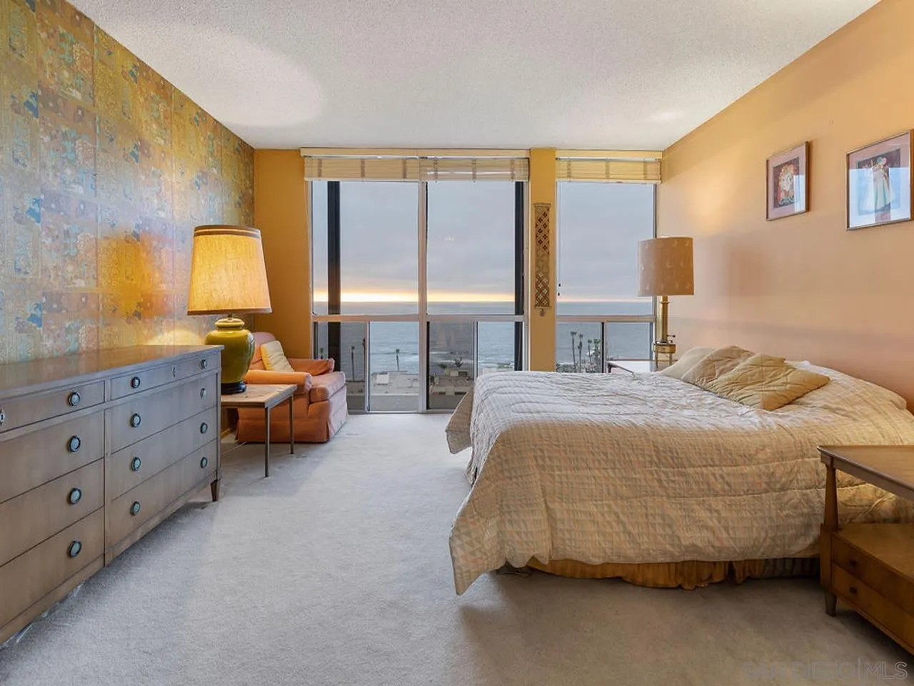 800 Prospect Street, Unit 4A La Jolla, CA 92037 - Photo 30 of 34 a bedroom with a bed and lamp