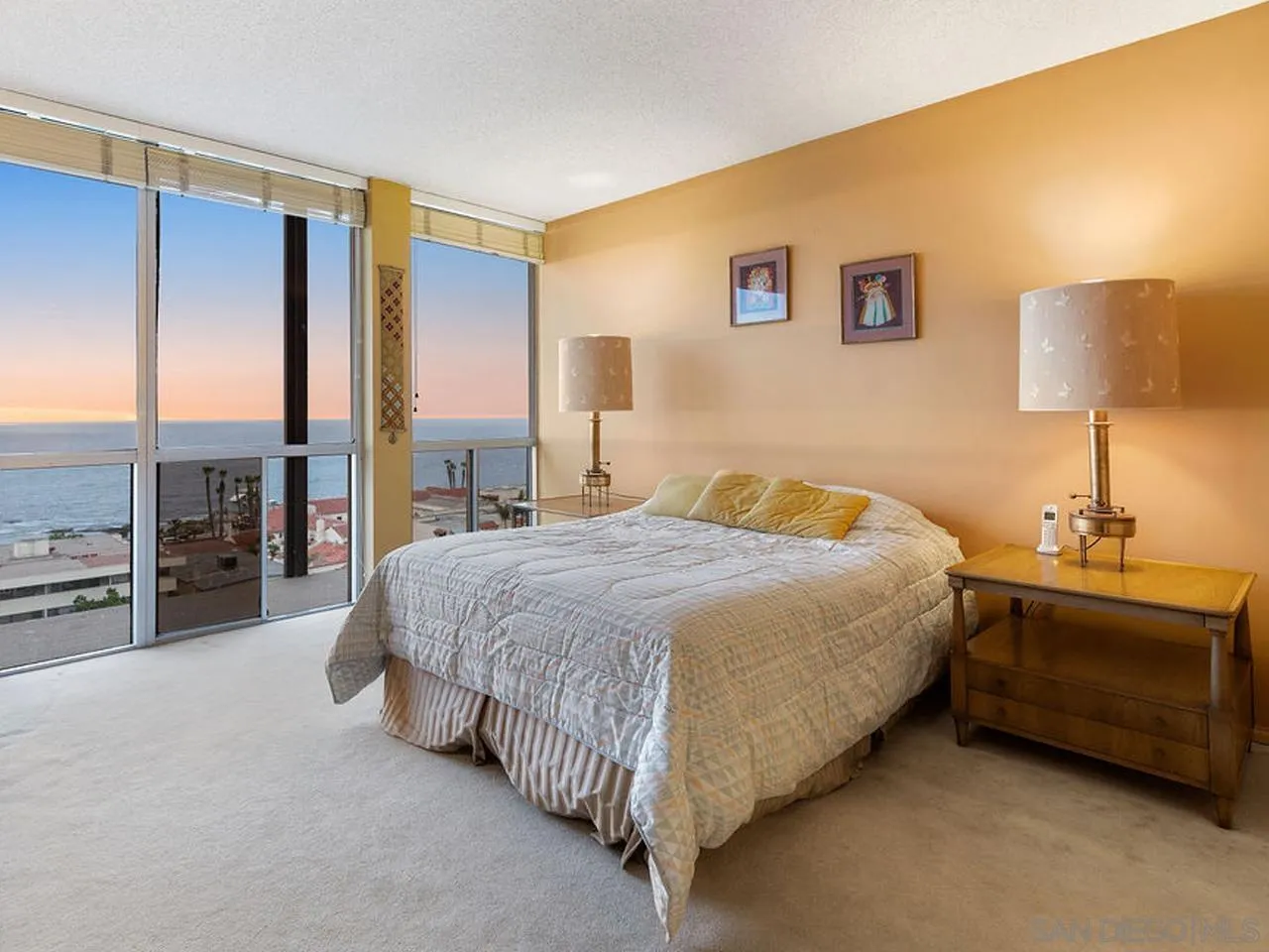 800 Prospect Street, Unit 4A La Jolla, CA 92037 - Photo 31 of 34 a spacious bedroom with a bed and walk in closet