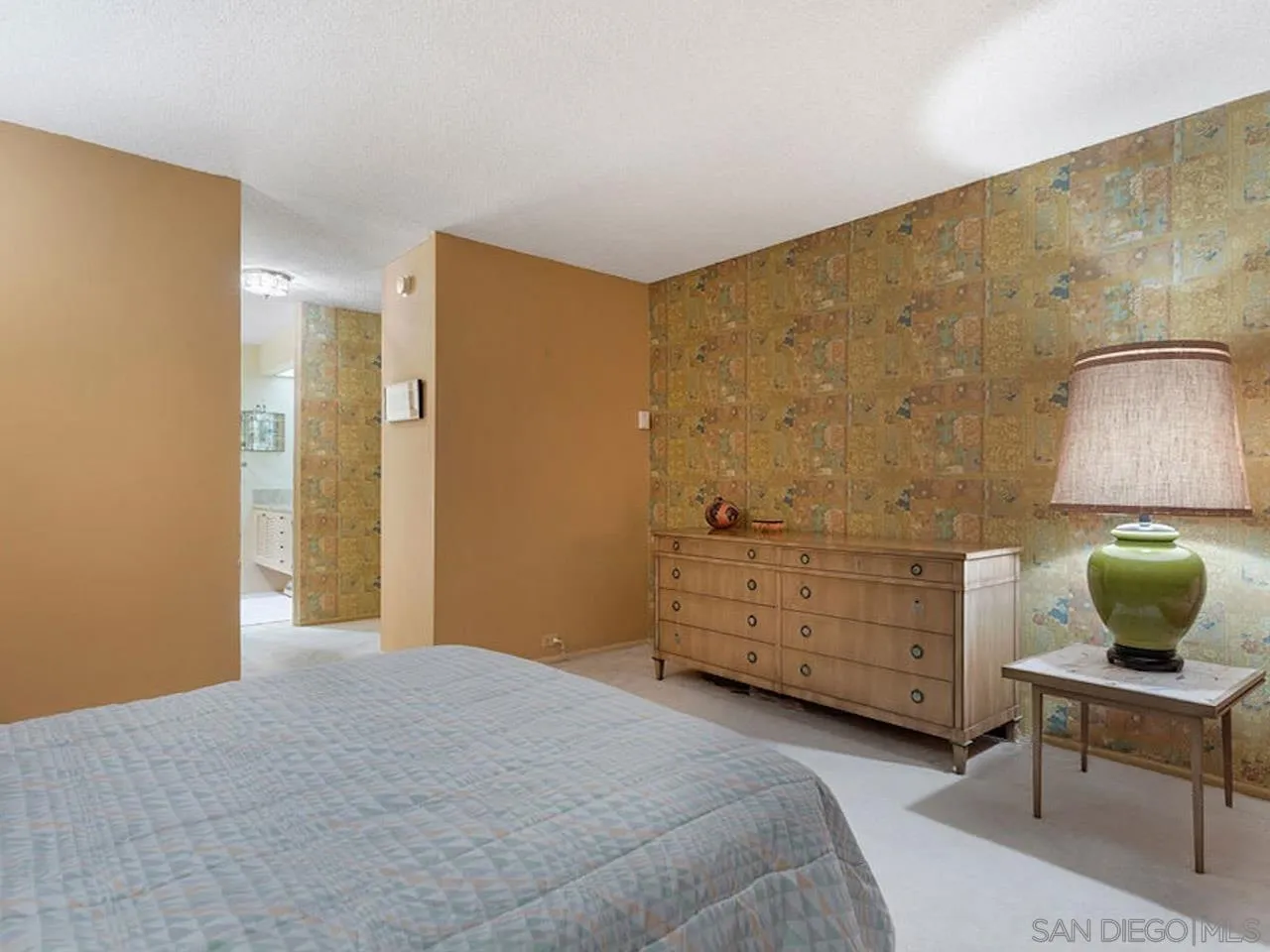 800 Prospect Street, Unit 4A La Jolla, CA 92037 - Photo 32 of 34 a bedroom with a bed and a dresser