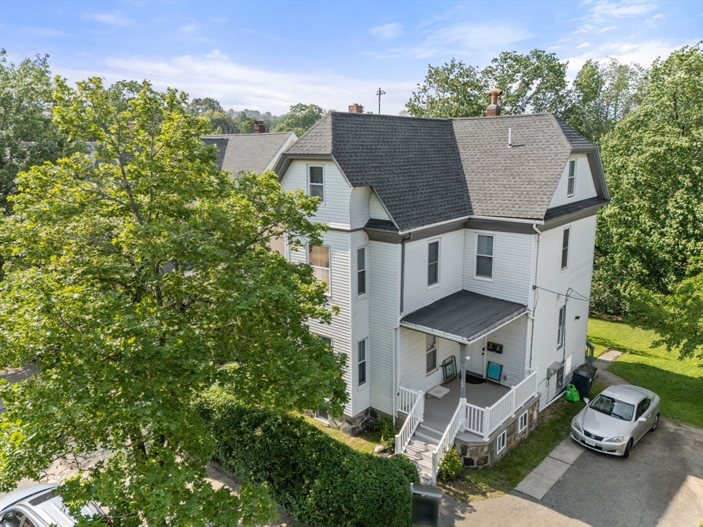 103 Belgrade Avenue, Unit 2 Boston, MA 02131 - Photo 20 of 24 an aerial view of a house with a yard
