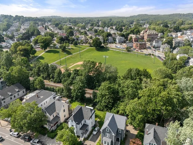 an aerial view of residential house with outdoor space